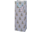 Light blue gift bag with Christmas tree and star patterns, featuring a gift tag.