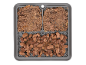 Lick mat with pate and chunks of meat in gravy for pets.