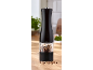 Black pepper mill with a transparent chamber filled with colorful peppercorns.