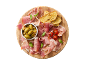 Wooden board with serrano ham, olives, cherry tomatoes, and toasted bread.