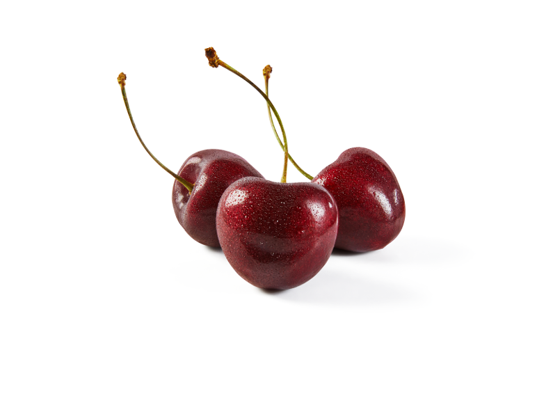 Three fresh red cherries with stems, covered in water droplets.