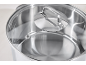 Stainless steel pot with a glass lid and metal handle, with volume markings inside.