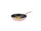 Pink frying pan with stir-fried vegetables