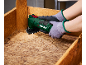 Electric delta sander used for sanding a wooden surface.
