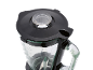 Black blender lid with transparent cap and glass jug with measurements.