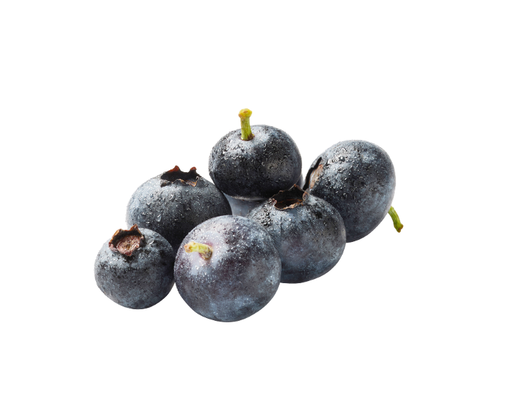 Fresh blueberries with water droplets on a black background.