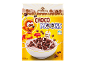 Packaging of chocolate cereal with a cartoon alien and a bowl of milk.
