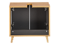 Light wood bathroom vanity with black doors and angled legs.