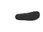 Black shoe sole with traction pattern, bottom view.