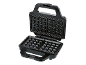 Open black waffle maker with square grids on a black background.