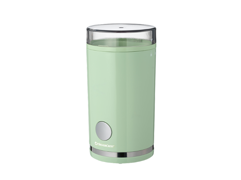 Mint green electric coffee grinder with a clear lid and a silver button.