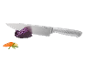 Kitchen knife with red cabbage, carrot, and rosemary on a black background.
