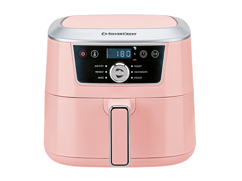 Pink air fryer with digital display showing 180 degrees, and cooking functions like air fry, roast, bake.