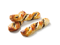 Puff pastry twists with chocolate on a white background.