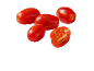 Fresh, red plum tomatoes, some cut in half.