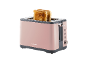 Pink toaster with two slices of golden-brown toast, on a black background.