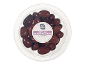 Kalamata olives with pits in a transparent container, with label