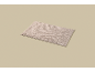 Rectangular beige bath mat with looped texture on a neutral background.