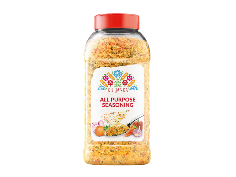 All-purpose seasoning jar with floral label and spoon of spices.