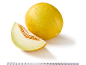Whole yellow melon and a slice on a white background.