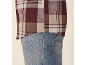 Brown and beige plaid shirt with blue jeans.