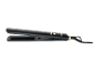 Black hair straightener with gold buttons and 'BEAUTY' text.