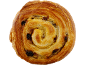 Golden-brown pain aux raisins, a swirled pastry with raisins, on a black background.