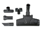 Vacuum cleaner accessories: floor nozzle, brush, crevice tool, and adapters.