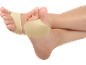 Feet with flesh-colored dance pads.