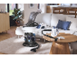 Vacuum cleaners and steam cleaner in a modern living room