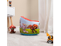 Inflatable children's armchair with cartoon characters, plush toys, and a toy car on a rug.