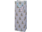 Light blue gift bag with Christmas tree and star patterns, featuring a gift tag.