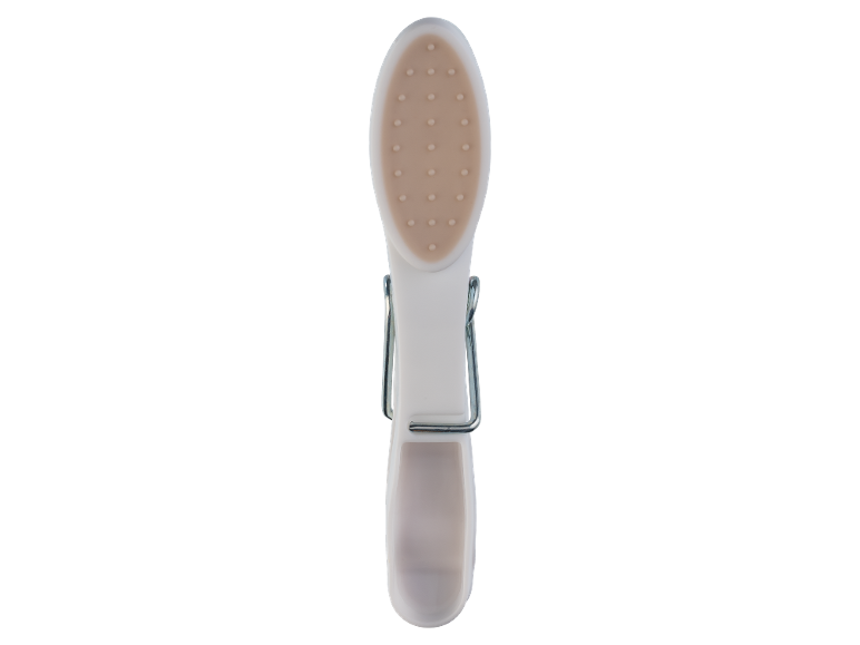 White clothes peg with a beige rubber grip and a metal spring.