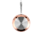 Copper frying pan with a metal handle and an induction base with cooking symbols.