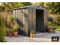 Grey garden shed on a wooden deck with potted plants and a fence in the background.