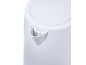 Close-up of a white kettle with a water filter.