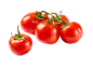 Fresh red tomatoes on the vine and a single tomato to the side.