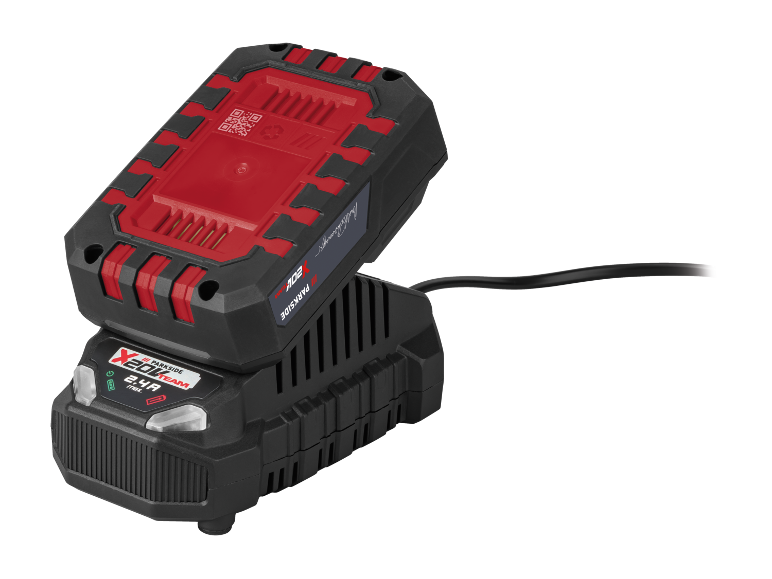 A black and red power tool battery charging on a black charger with a cable.