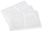 Several white silica gel or moisture absorber packets, stacked on top of each other.