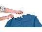 Hands hanging a blue cardigan on a white hanger