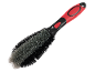 Wheel cleaning brush with a red and black handle and grey bristles.
