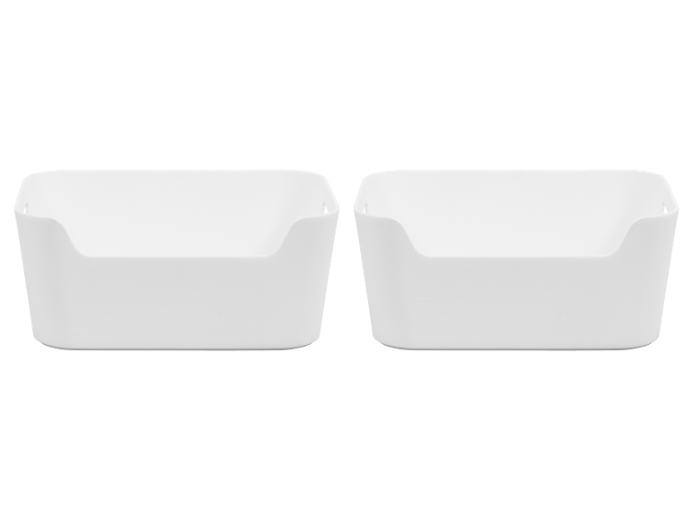 Two white plastic storage bins with a front cutout.