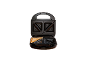 Open sandwich maker with one toast inside on a black background.
