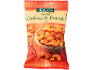 Roasted cashews and peanuts with chili flavor in a red and beige bag.
