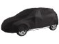 Black car cover, protecting from weather elements.