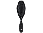 Black hairbrush with bristles and an ergonomic handle.