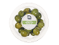 Green Nocellara olives from Italy with pits in a round transparent container.