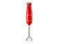 Red immersion blender with silver details and the text '1973' on the body.