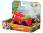 Red toy car with a firefighter puppy and a dinosaur, featuring a dinosaur movie theme.