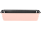 Pink loaf pan with a non-stick interior.
